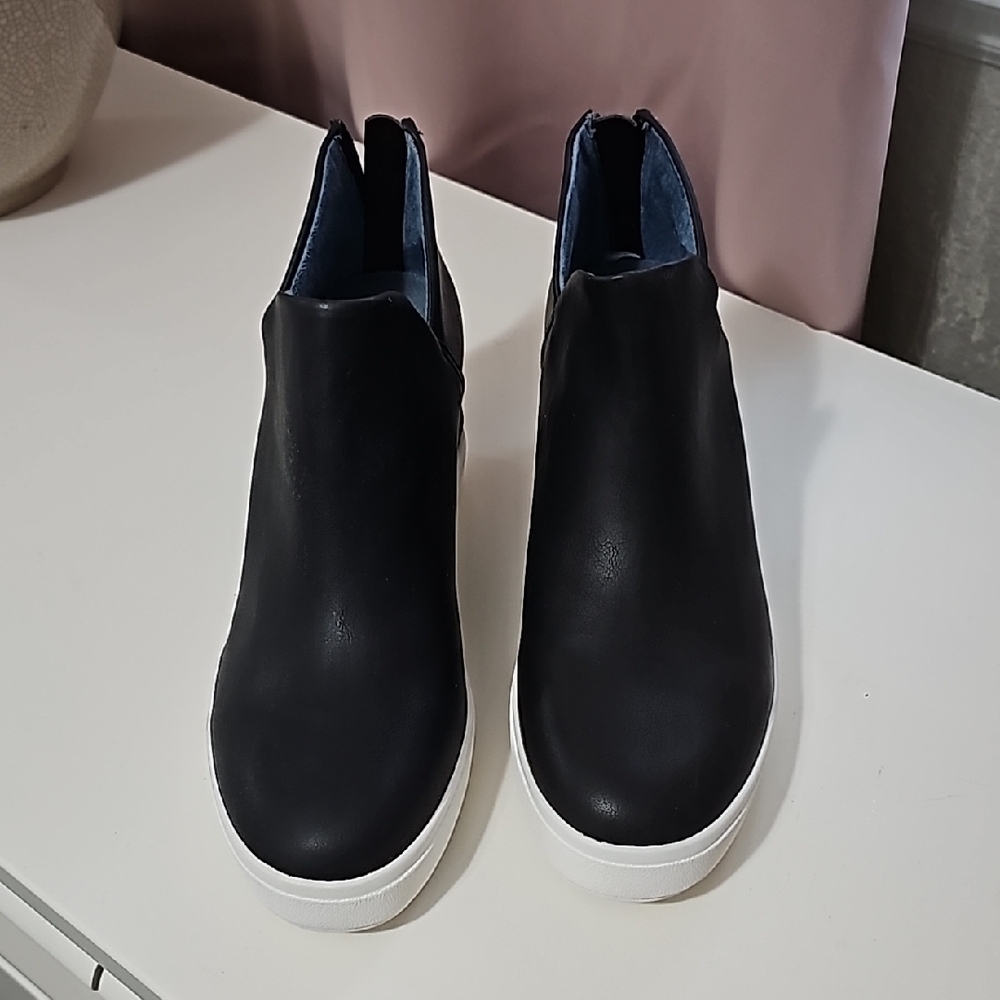 Black Slip-On Sneakers. Wedge sneakers with zipper in the back. Gently used.